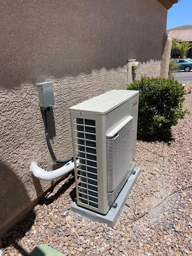 Residential air conditioning condenser unit in Farmington
